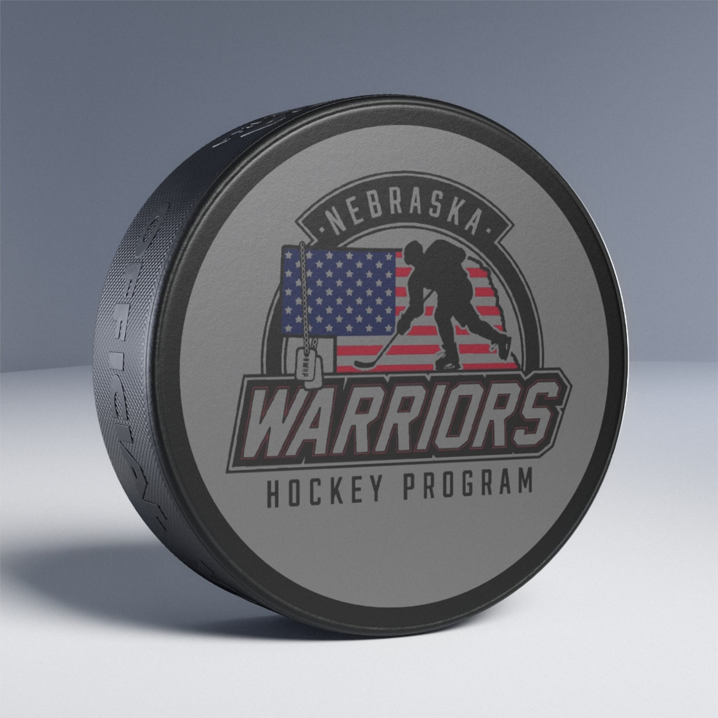 Nebraska Warriors Hockey Program - Puck